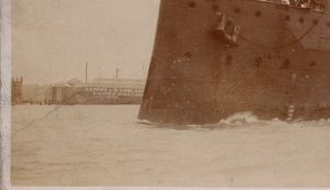 RPPC HMS Black Prince Royal Navy at Gosport Hampshire Camper & Nicholsons Bldg (back)