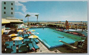 Postcard Miami Beach Florida c1950s The Casablanca Hotel Swimming Pool Umbrellas