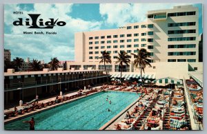 Postcard Miami Beach FL c1960s Hotel Dilido Swimming Pool Bathers Umbrellas 