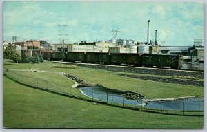 Postcard Fort Frances Ontario c1971 Paper Mill Park Lily Ponds Railroad Box Cars