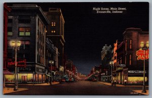 Postcard Evansville IN 944 Night Scene Main Street Walgreens Lowes Woods Drugs