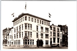 Postcard RPPC Rotterdam Netherlands Hotel Regina Cafe Restaurant Flags