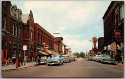 Postcard Gananoque Ontario c1960s King Street Looking East Old Cars Shops Signs