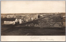 Postcard RPPC c1900s Yorkton Saskatchewan View of Main Street Elevators Railroad