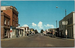 Postcard Brooks Alberta 2nd Street Looking North Old Cars Shops