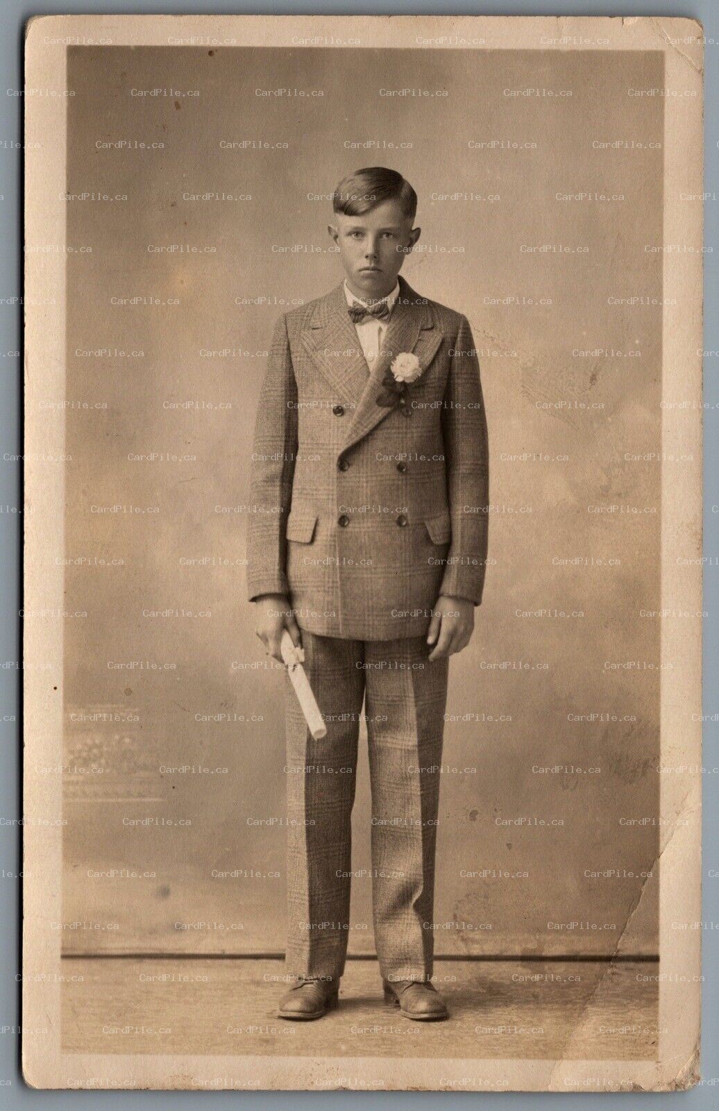Postcard RPPC United States c1920s Bloyd Thompson Suited Boy Standing with Paper