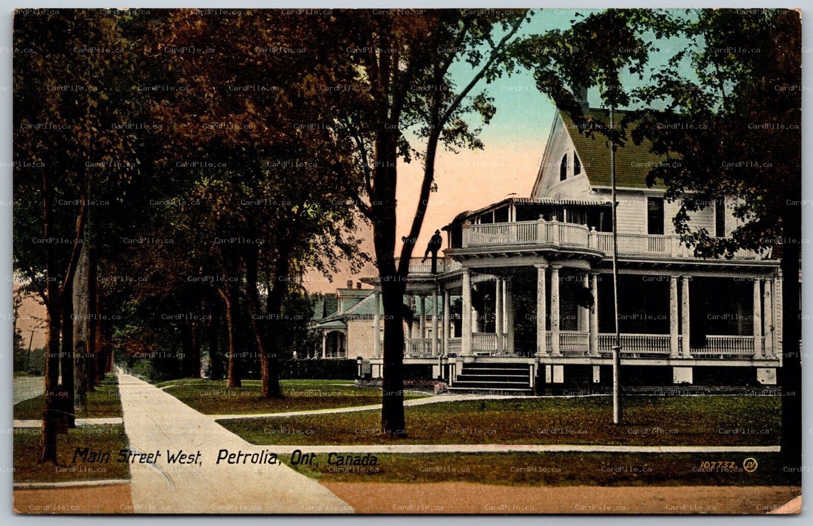 Postcard Petrolia Ontario c1910s Main Street West Man Climbing Balcony??