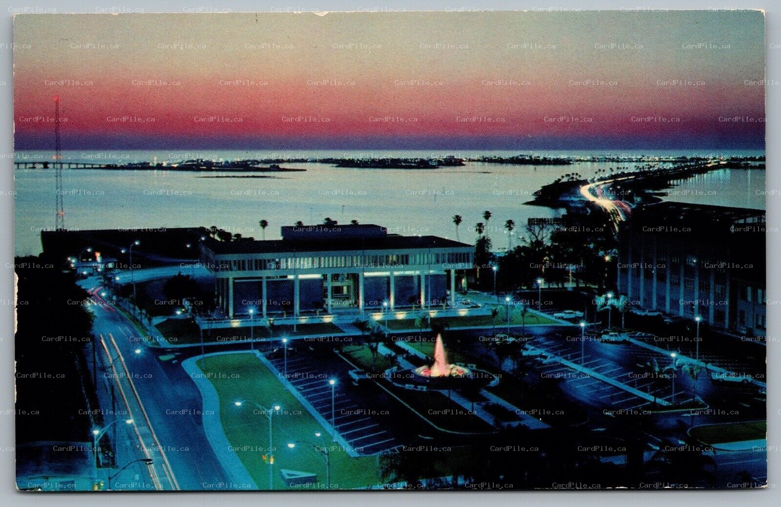 Postcard Clearwater Bay Florida c1960s Scene At Dusk Birds Eye View City Hall