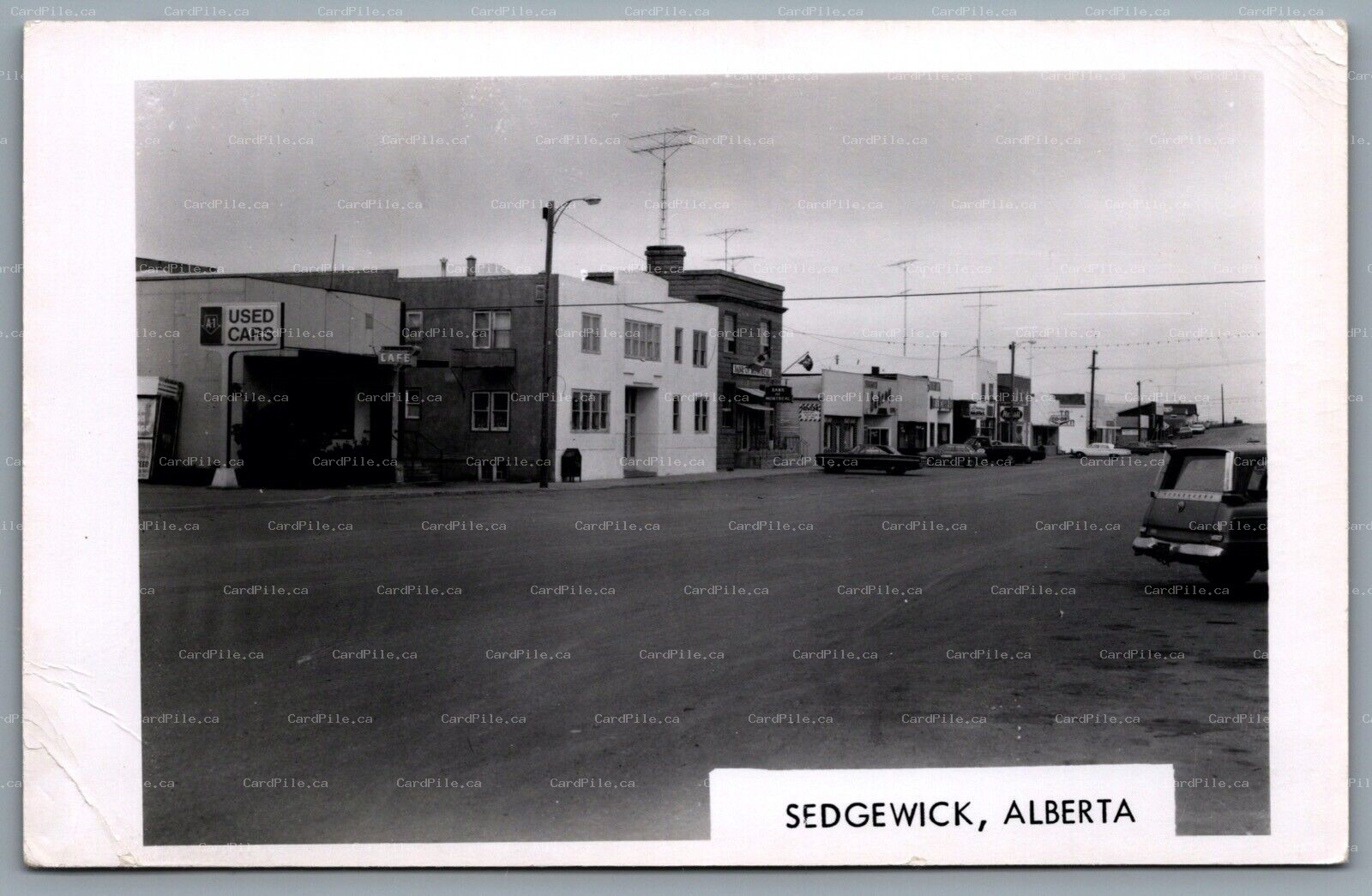 Postcard RPPC c1971 Sedgwick Alberta Street View Old Cars Rexall Co-Op Bank BMO