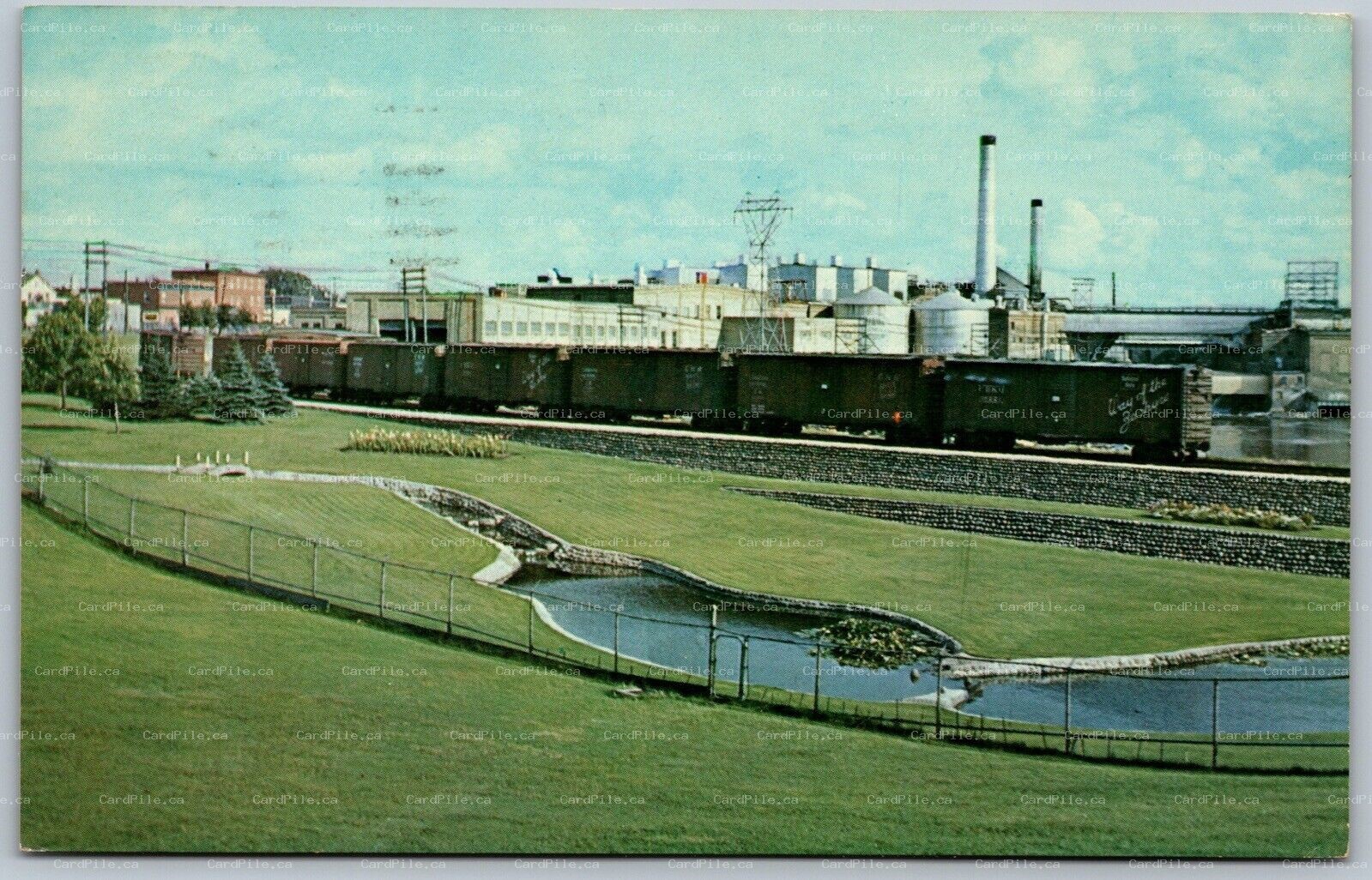Postcard Fort Frances Ontario c1971 Paper Mill Park Lily Ponds Railroad Box Cars