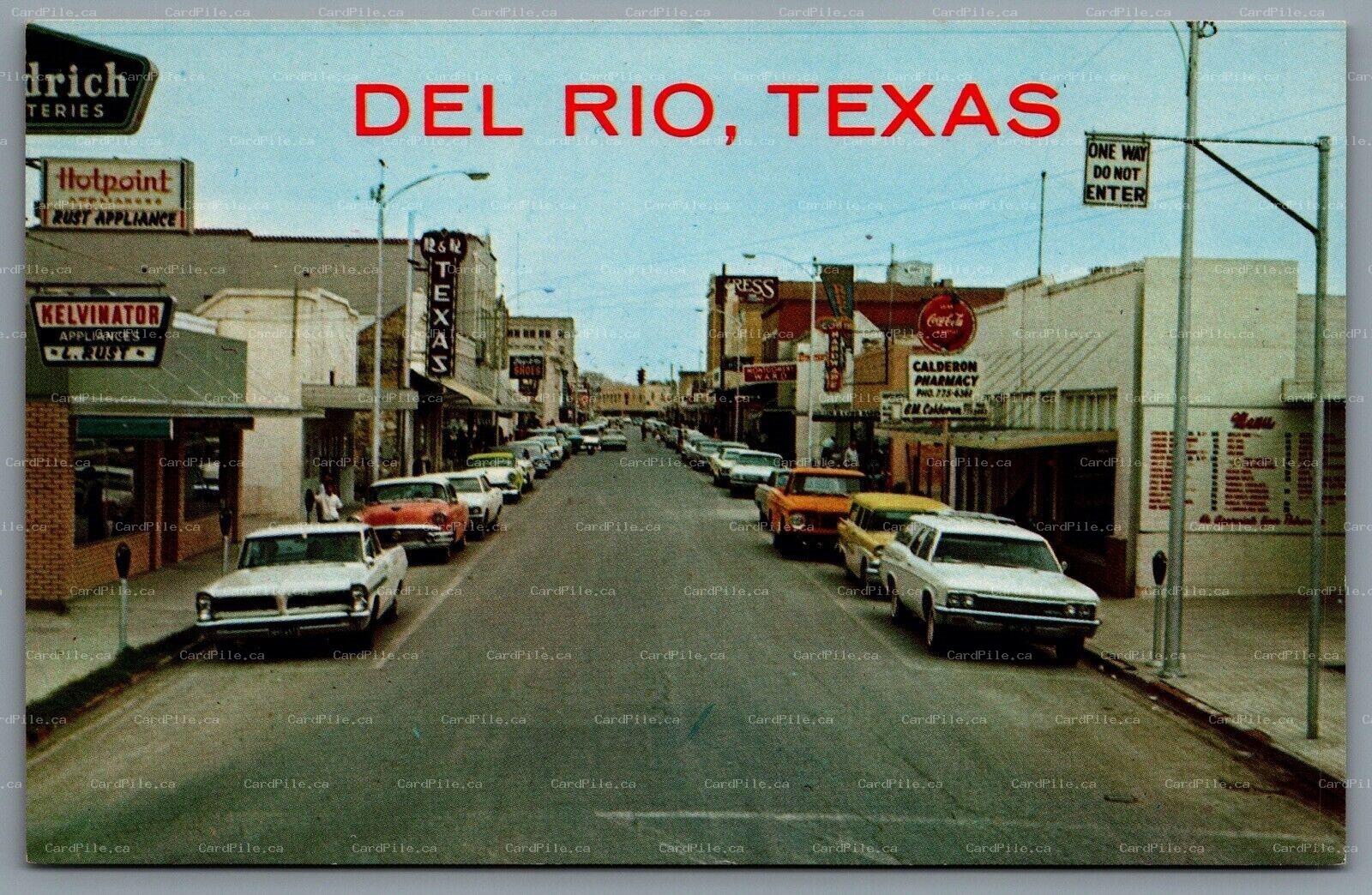 Postcard Del Rio TX c1970 Street View Coca Cola Kelvinator Calderon Old Cars