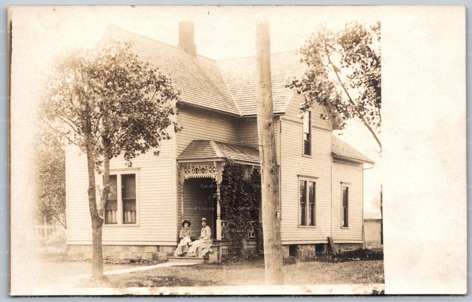 Postcard RPPC 1910s Unidentified Location North America Women Sitting House View