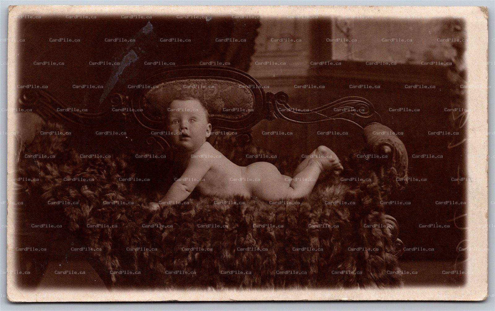 Postcard RPPC c1910s Studio Photo of Baby on Seti by Cooper Bros of Blackpool