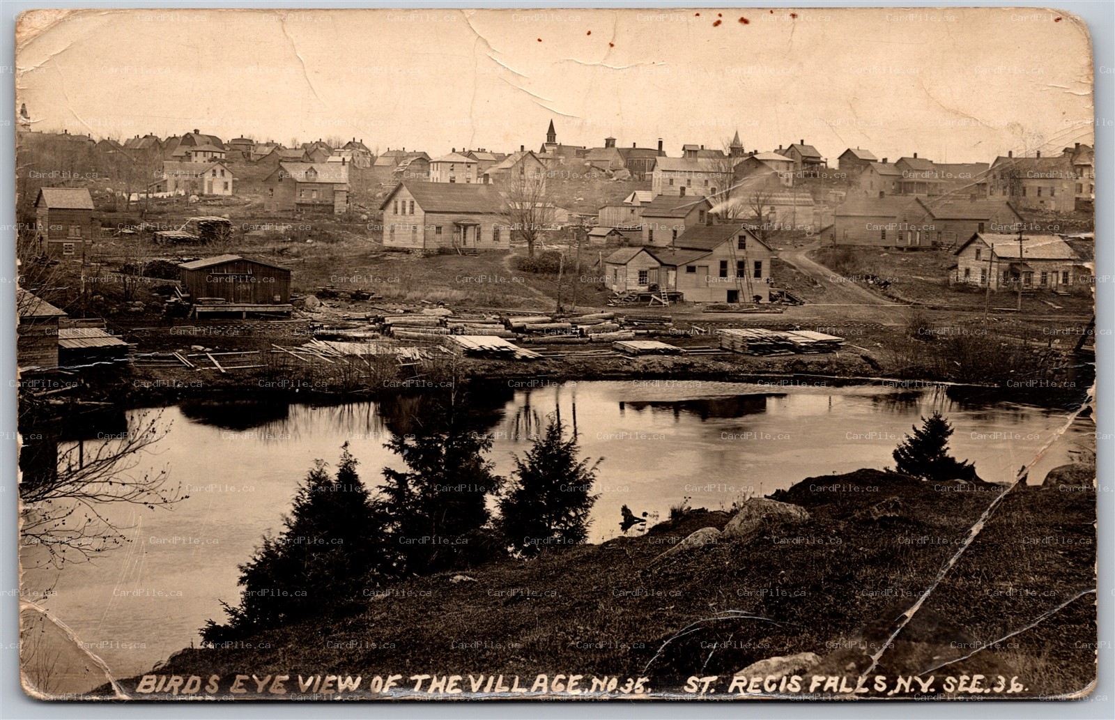 RPPC c1910s St. Regis Falls New York Birds Eye View of Village by Beach *as is*