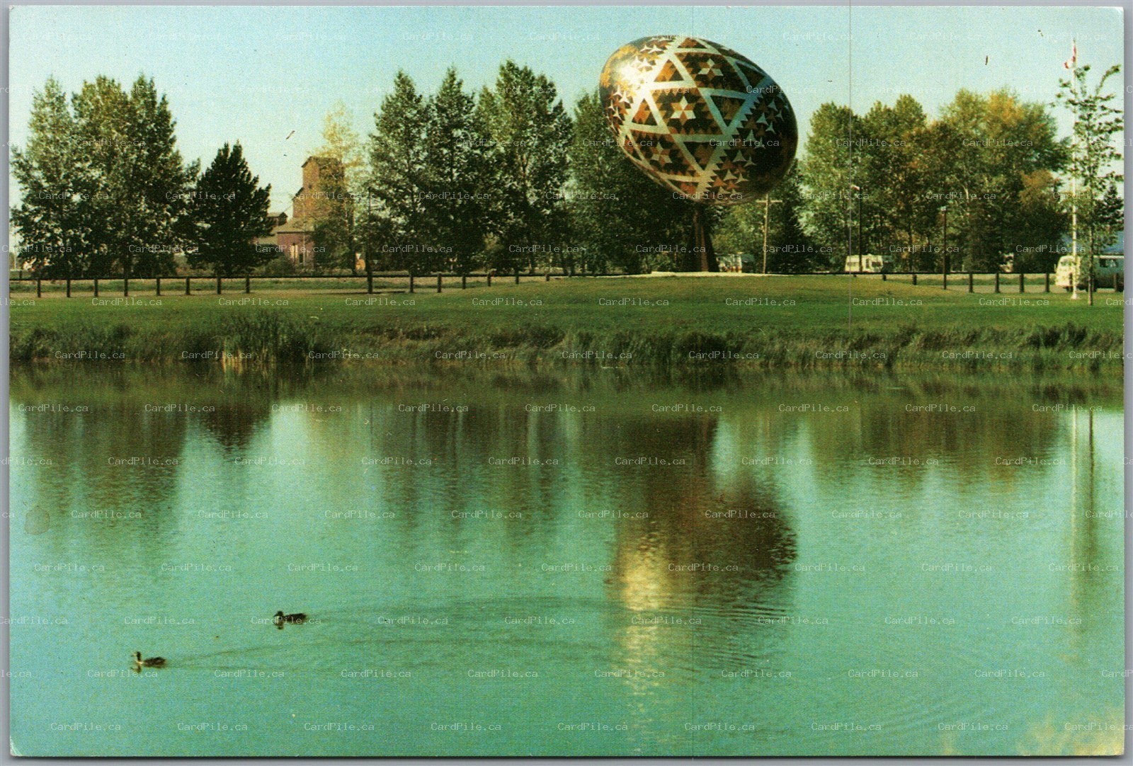 Postcard Vegreville Alberta World's Largest Pysanka Elks Fish Pond Reflection