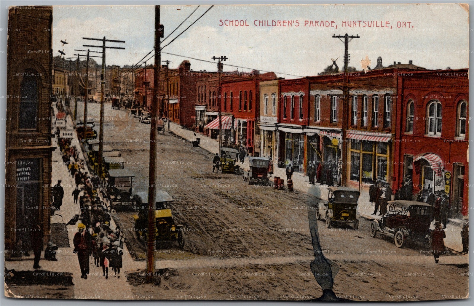  Postcard Huntsville Ontario 1910s School Children's Parade Street View *as is*