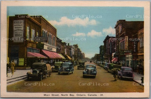 Postcard North Bay Ontario 1944 Main Street Old Cars Storefronts Air Mail Cancel