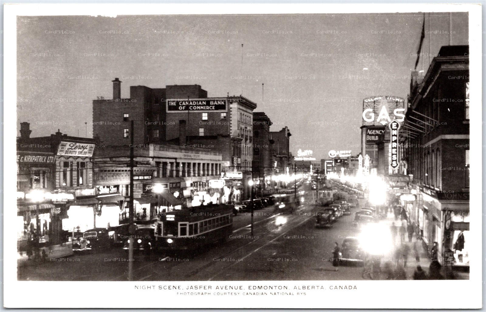 Postcard RPPC Edmonton Alberta Night Scene Jasper Avenue Signs Trolly 