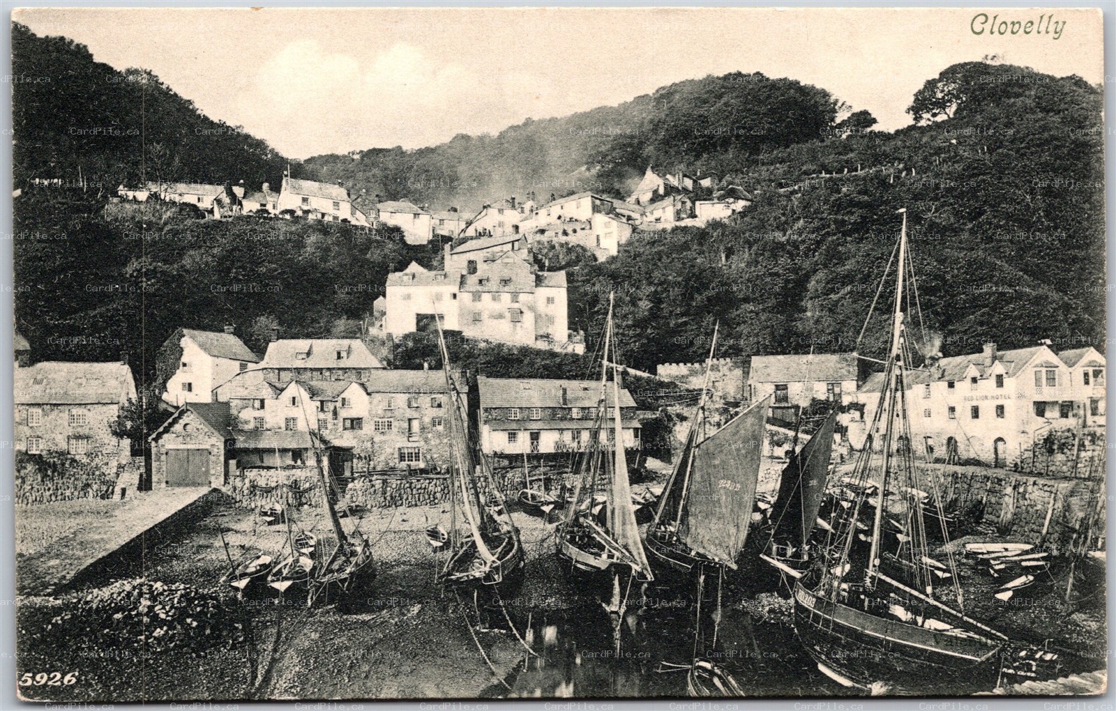 Postcard Clovelly England View of Harbour Quay Masted Fishing Boats Cottage