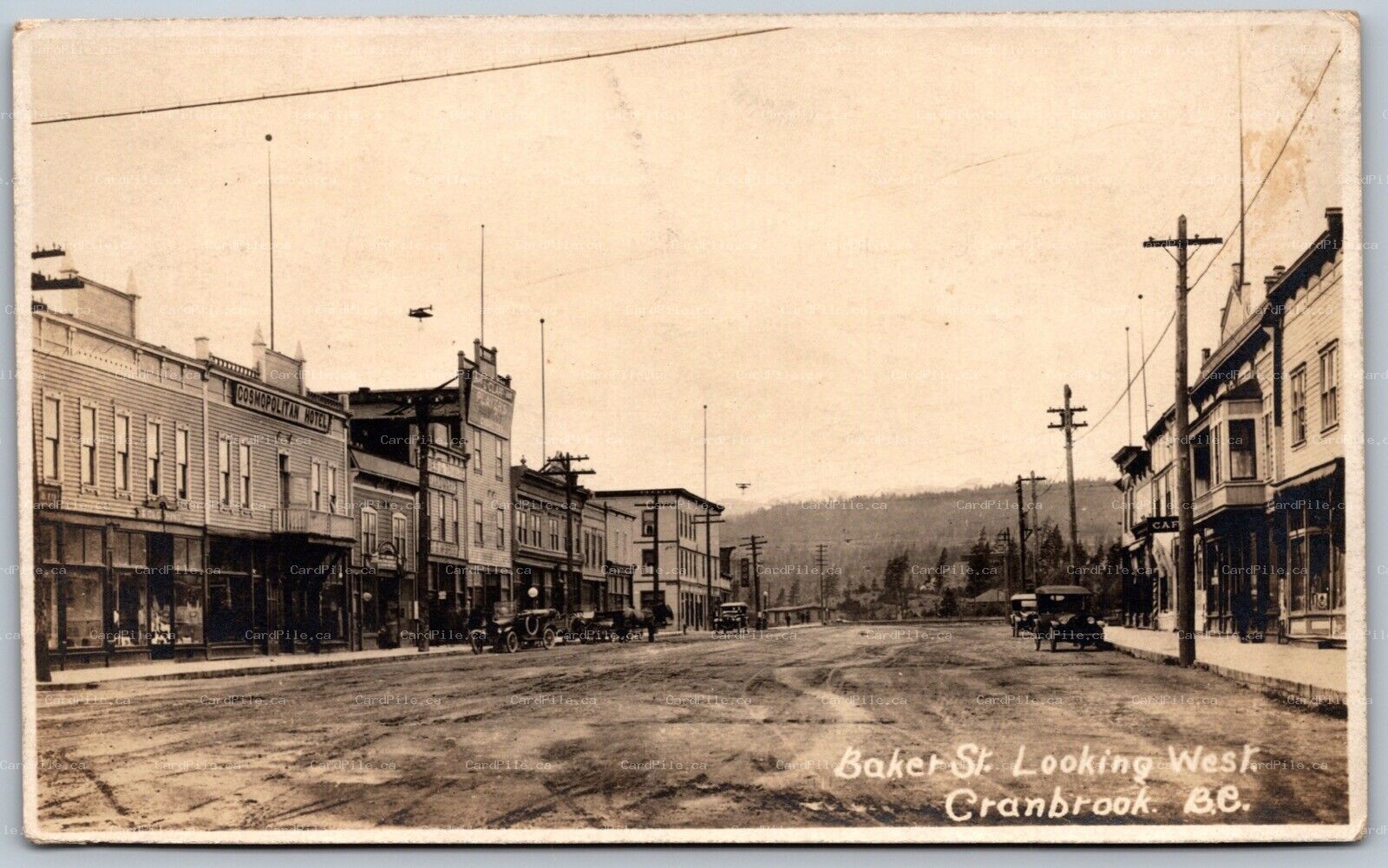 Postcard RPPC c1910s Cranbrook BC Baker St. View Looking West Old Cars Shops 