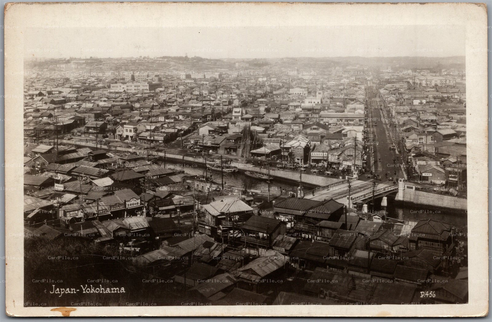 Postcard RPPC c1920s Yokohama Japan Birds Eye View Shops Signs River Boats