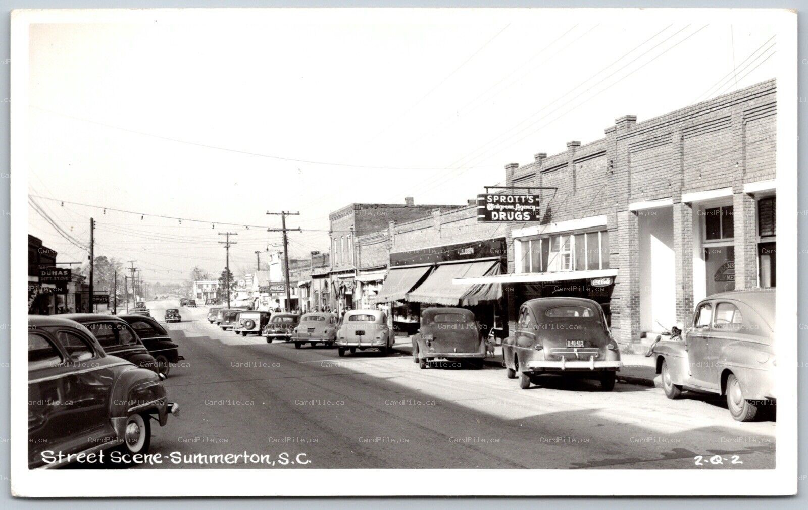 Postcard RPPC c1940s Summerton South Carolina Street Scene Old Cars Shops Signs