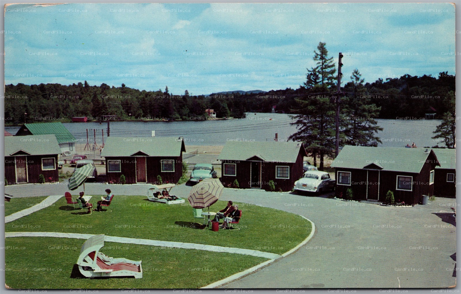 Postcard Old Forge New York c1952 Clark’s Lakeside Motel Adirondacks Old Cars