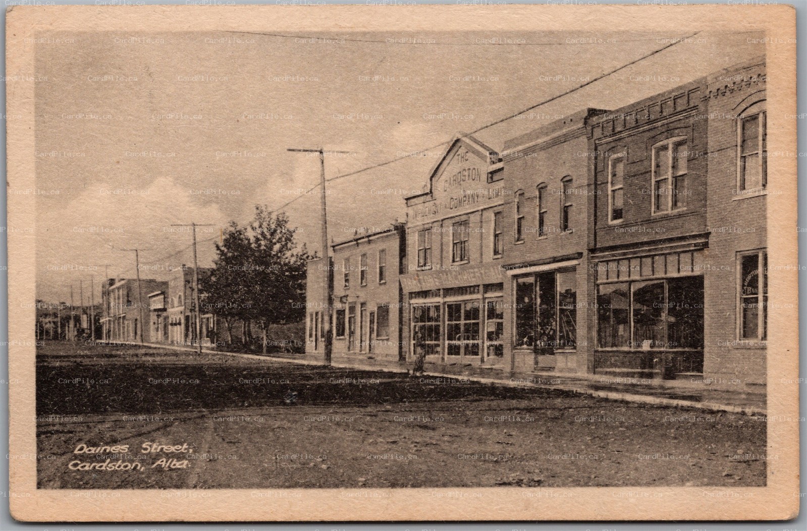 Postcard Cardston Alberta Daines Street Implement Company Tractors Machinery