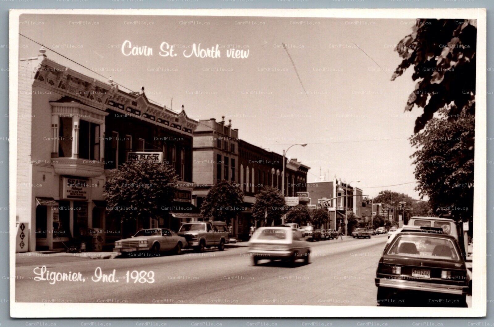 Postcard RPPC c1983 Ligonier IN Cavin St. North View Old Cars Sears Merchant